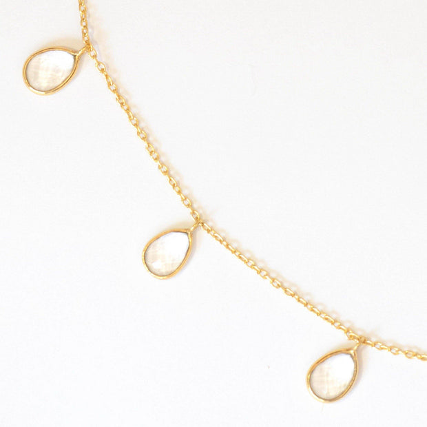 Three crystal stones are delicately attached to a fine gold plated chain to create this elegant and easy to wear bracelet