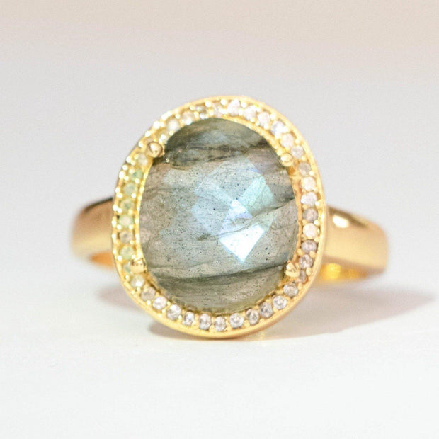 Simone Watson Jewellery - A beautiful ring featuring a rose cut Labradorite stone surrounded by a halo of pave set cubic zirconias