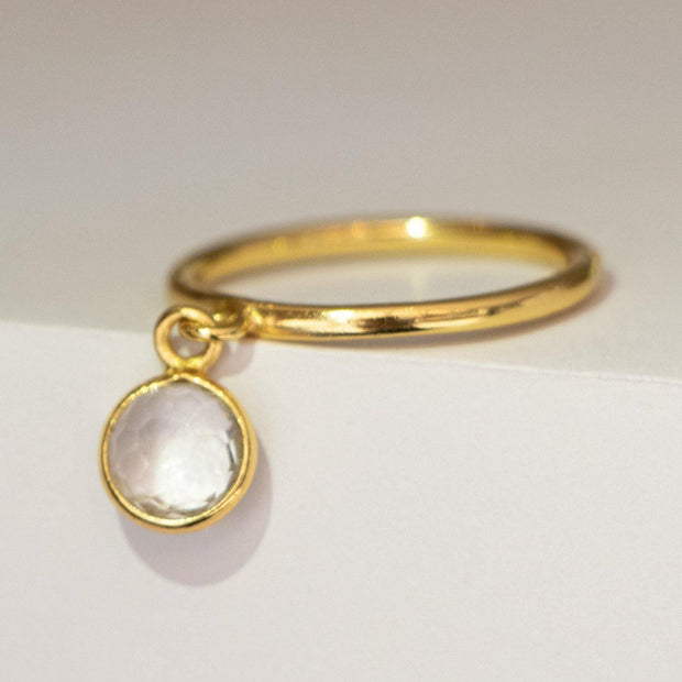 Simone Watson Jewellery - This is the perfect stacking ring addition featuring a round Crystal Quartz stone charm set on a smooth gold-plated band. Have fun with this ring by stacking many together or add to other ring stacks