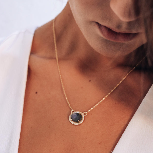 Simone Watson Jewellery Collections This beautiful pendant features a naturally shaped Labradorite semi-precious gemstone surrounded by a halo of pave set cubic zirconias set on a dainty adjustable sterling silver chain