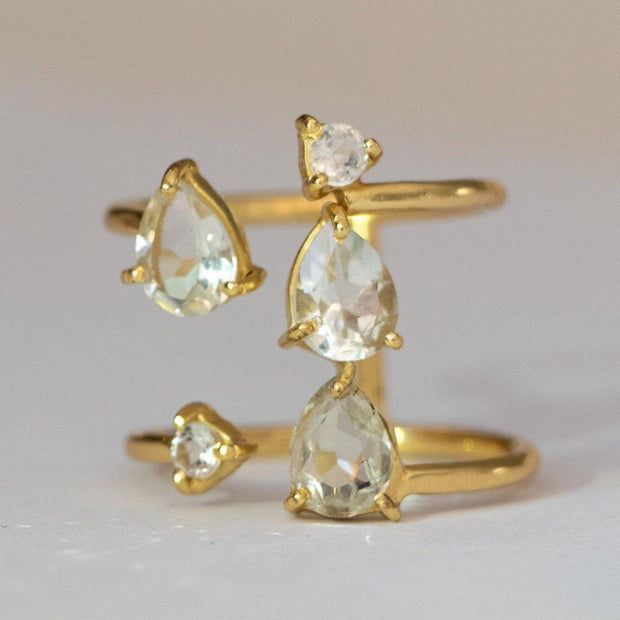 Stunning and unique, our Cascade ring features Green Amethyst semi precious stones set on a double band cuff style setting. Handmade in silver and 14 carat gold plating 