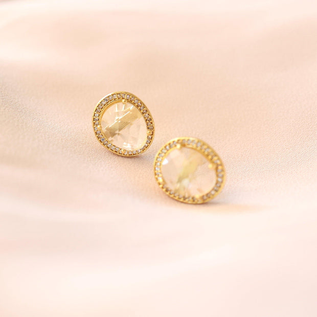 A pair of beautiful rose cut Crystal Quartz stones set in a pave halo and handmade in sterling silver and 14 carat yellow gold plating - adding a subtle finishing touch to your day or night look