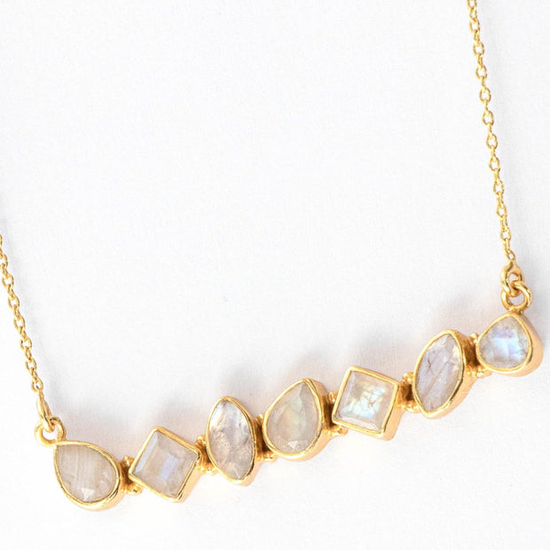 Our Moonstone Bar Necklace features an array of semiprecious stones creating a bold bar style necklace 