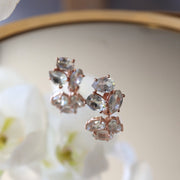 A pair of Green Amethyst cluster studs feature three uniquely shaped semi-precious gemstones. Wear these day or night to add a subtle touch of glamour to your look 
