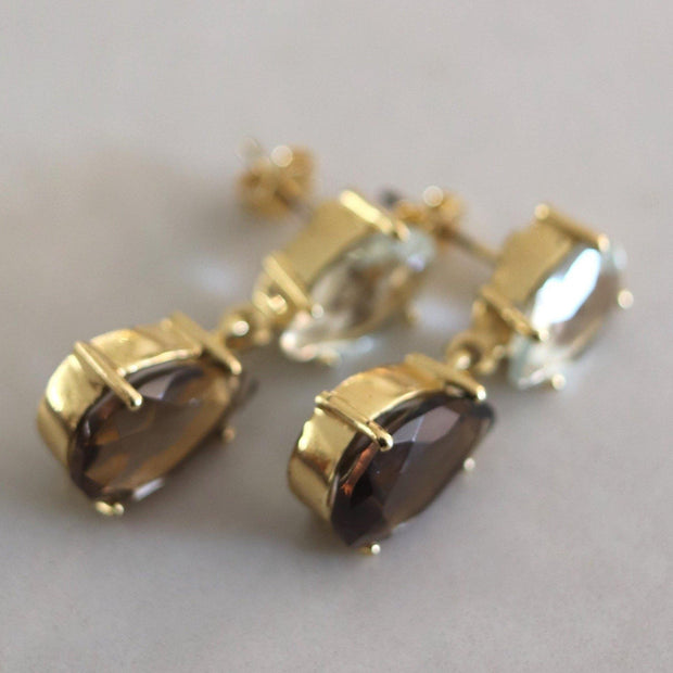 A pair of classic style drop earrings featuring pear shaped Smokey Quartz and Green Amethyst stones - perfect to be worn at the office or for a special occasion