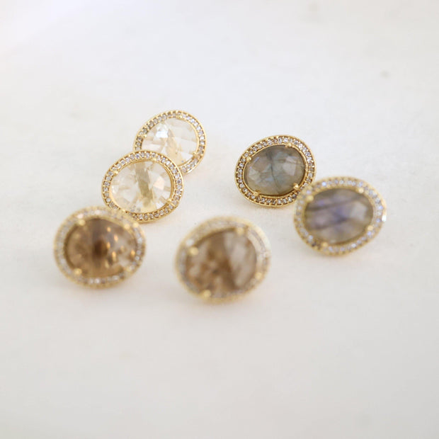 A pair of beautiful rose cut Labradorite stones set in a pave halo and handmade in sterling silver and 14 carat yellow gold plating - adding a subtle finishing touch to your day or night look