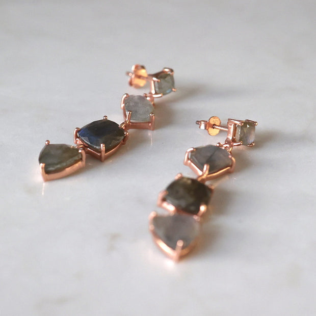 Beautiful and bold - these stunning cascade drop earrings are handmade in sterling silver and plated with thick 14 carat rose gold, featuring four Labradorite semi precious gemstones