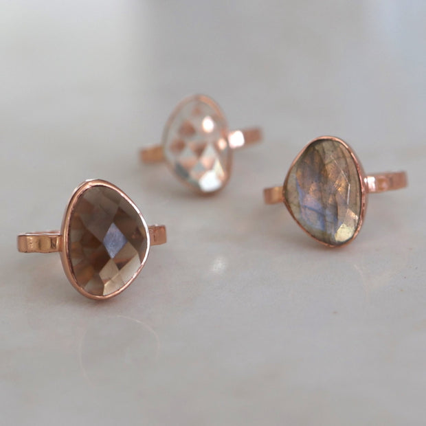 A beautiful Labradorite solitaire stone is set on a single band - perfect for wearing alone or with stacking rings