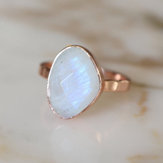 This magical rose cut Rainbow Moonstone is centre stage in this solitaire ring design. A perfect addition to a ring stack or bold enough to be worn on its own