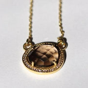 Simone Watson Jewellery - This beautiful pendant features a naturally shaped Smokey Quartz semi-precious gemstone surrounded by a halo of pave set cubic zirconias set on a dainty adjustable chain